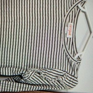 Showcase a timeless striped pattern sleeve shirt